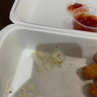 Pile of onions I asked NOT to have on my sandwich.