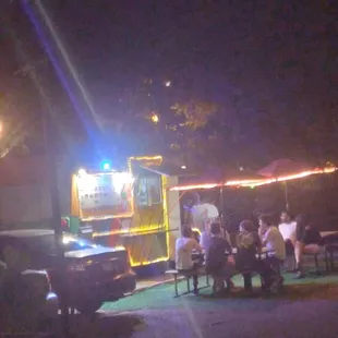 a food truck parked in a parking lot