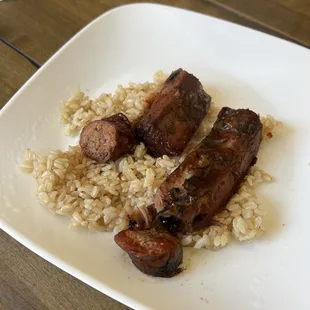 Very tasty bbq pork ribs and hot link- added my own brown rice