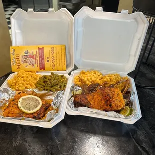 two take out containers of food