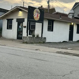 I didn't get close enough to read the message on the door, but it was closed and as you can see it was not late for a Saturday.