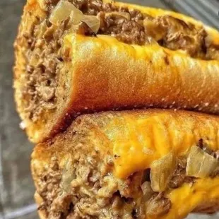 a closeup of a meat and cheese sandwich