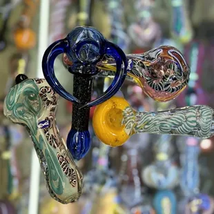 a variety of glass pipes