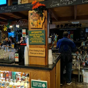 a bar with a lot of bottles