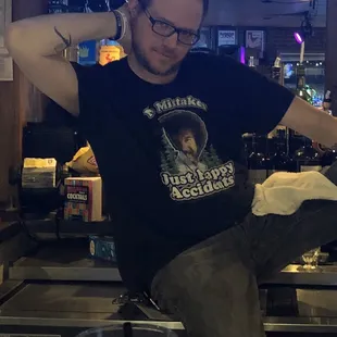 a man sitting at the bar