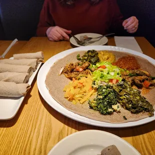 Another view of the sampler, along with extra injera sponge beead