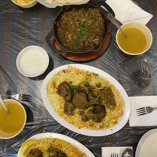 Marq in the small bowls ,   Two big plates of Mandi GOAT