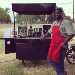 a man in a red apron