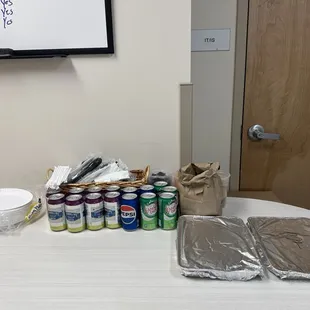 a table with cans of food