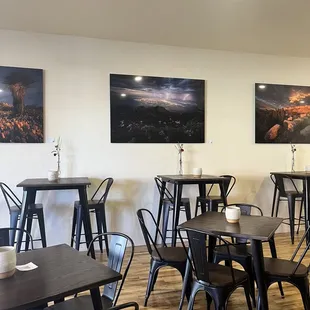 a dining room with tables and chairs