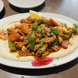 Hummus with chicken ghallaba. Excellent food and service.