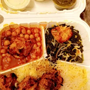 Chicken kabob, with basmati rice, side spinach and chickpeas.
