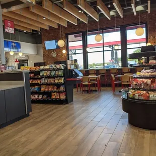 Lots of room within the store with a dining area off to the side