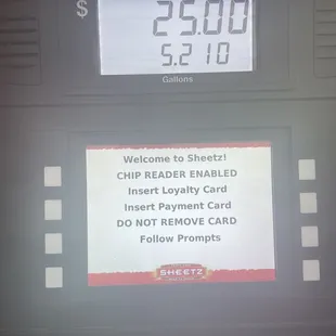 a close up of a sign on a gas pump