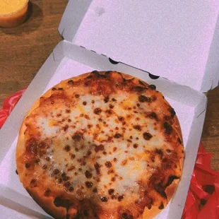 a pizza in a box on a table