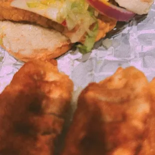 a sandwich and potato chips on a table