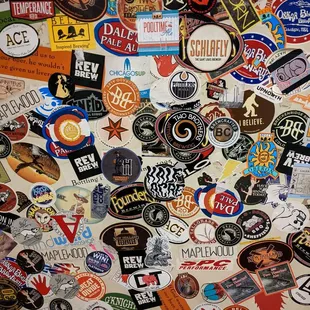 a wall of beer labels