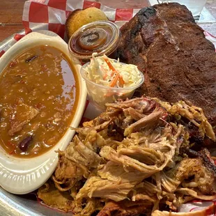 BBQ Combo with pork and ribs, beans, coleslaw, corn muffin