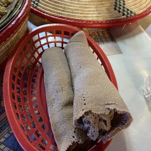 two burritos in a basket