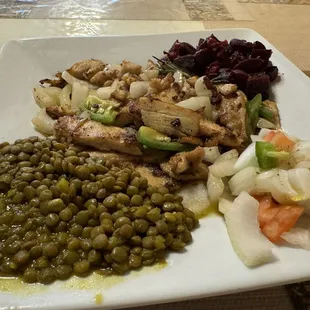 Chicken steak  Cooked in butter with fresh onions and tomatoes and green lentils and red beets