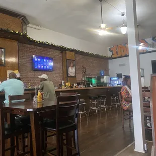 people sitting at a bar