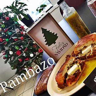 a plate of pizza and a glass of beer