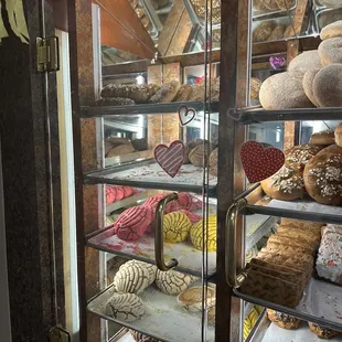 a display case full of pastries