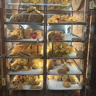 a display case full of baked goods