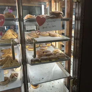 a display case full of pastries