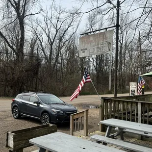 Look for the sign and flags.