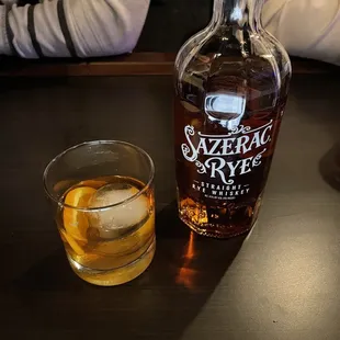 a bottle of bourbon and a glass of whiskey