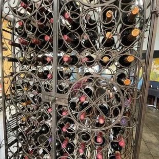 a rack of wine bottles