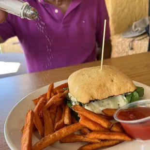 He got a Grilled Basil Pesto Chicken Sandwich and it was delicious. Needs more sweet potato fries tho.