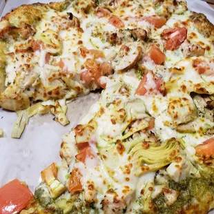 Pesto, grilled chicken, artichoke, and tomato.