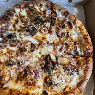 Shelby's Philly no  chicken add pepperoni  No bell pepper add extra grilled onions Extra Alfredo sauce on hand tossed crust.