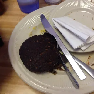 Yep they served this with a smile!!! It's a sausage coal puck!