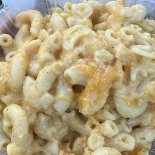 Mac &amp; cheese. Seasoned well and creamy, cheesy yumminess on your palette.