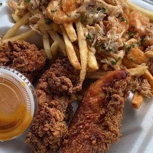 Chicken tenders and loaded seafood fries, from his last visit to GSO.