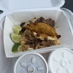 1 Birria Taco with Consomme 1 Pollo Taco