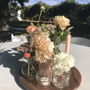 Gorgeous table arrangement and nice champagne grapes hanging in the background