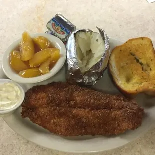 a plate of fish and bread