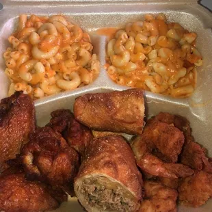 Wing and shrimp plate with double Mac and Philly cheesesteak egg roll