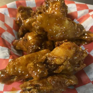 WINGS TOSSED IN SHELLUKES SAUCE