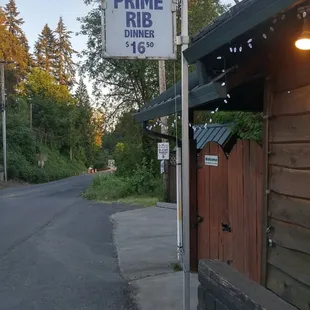 a sign on the side of the road