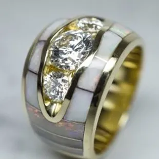 Elliott Shelton's custom mens band with opal inlay and diamonds in yellow gold