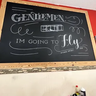 a blackboard with a quote on it