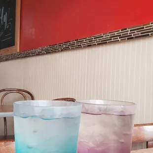 Water in cool colored cups