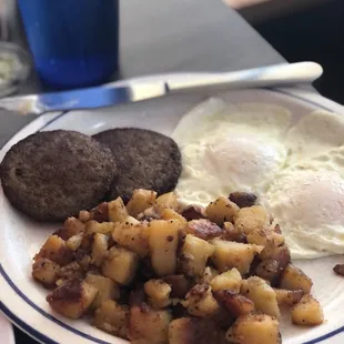 Home fries, over easy eggs, sausage Pattie&apos;s.