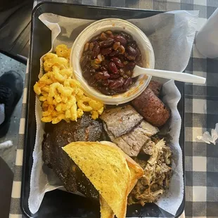 Smokehouse, ribs, smokehouse, mac &amp; cheese, baked beans, smoked sausage smoked brisket and pulled pork