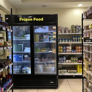 the frozen food section of a grocery store